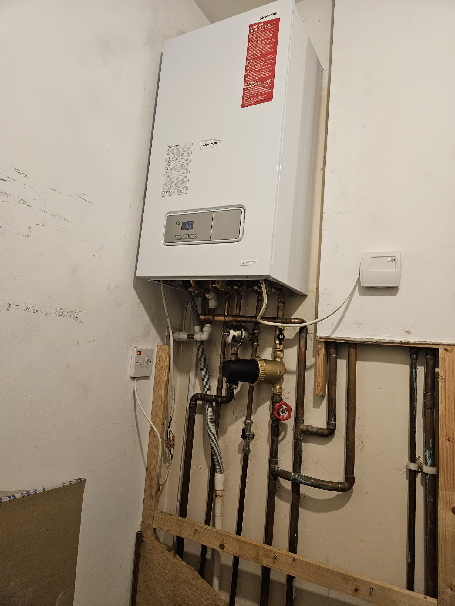 Little Plumb engineer carrying out boiler maintenance in a Torquay home
