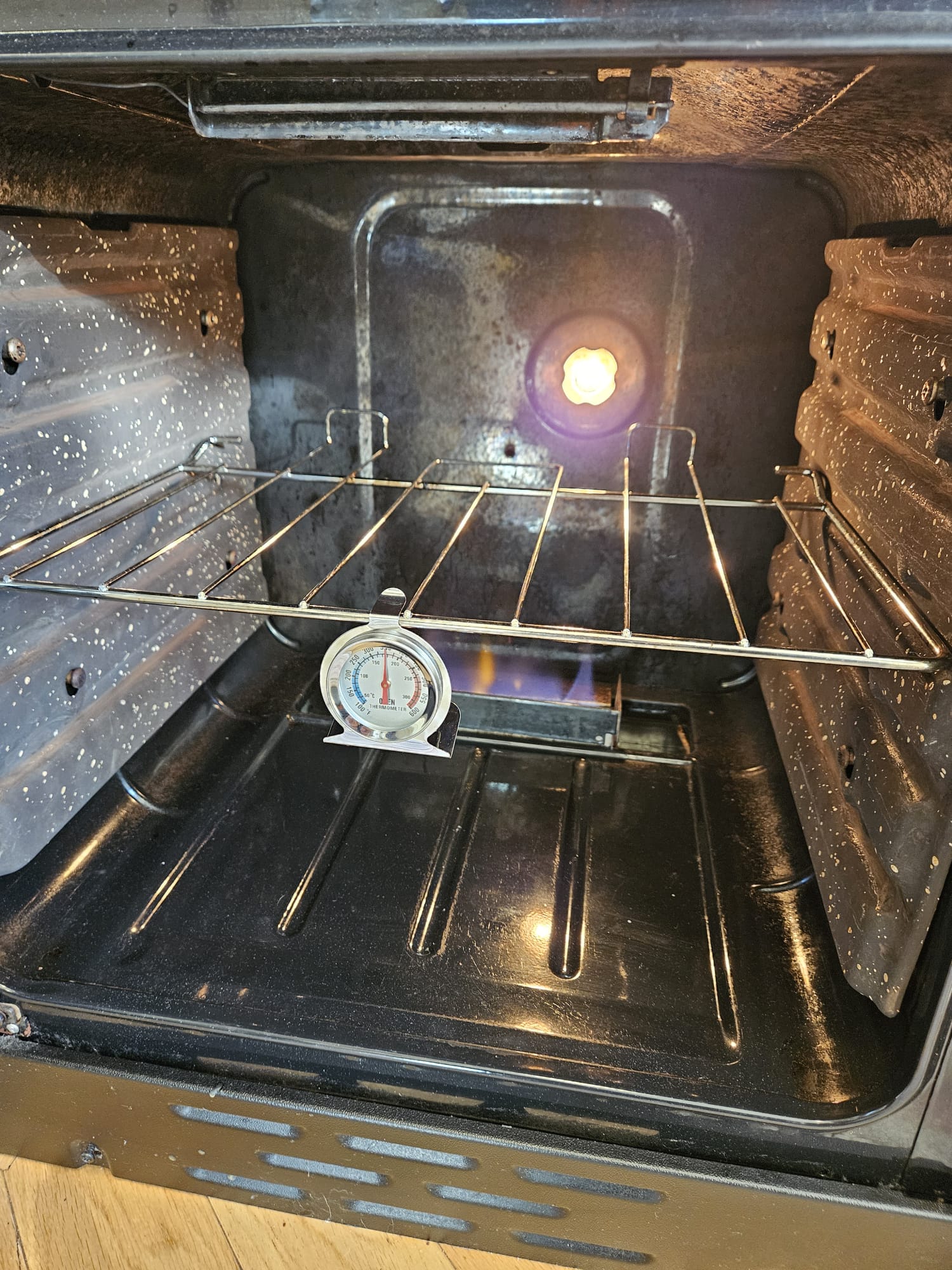 Close-up of a gas hob control knob on an LPG-supplied cooker